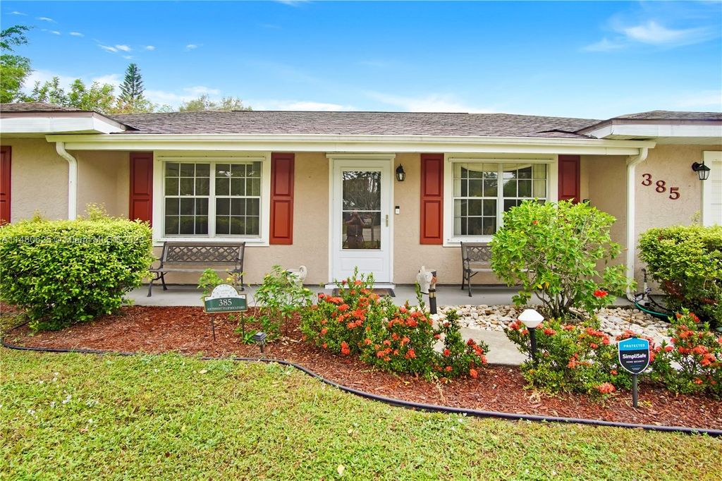 Photo of 385 SW Tulip Blvd, Port Saint Lucie, FL 34953 (MLS # A11480625)