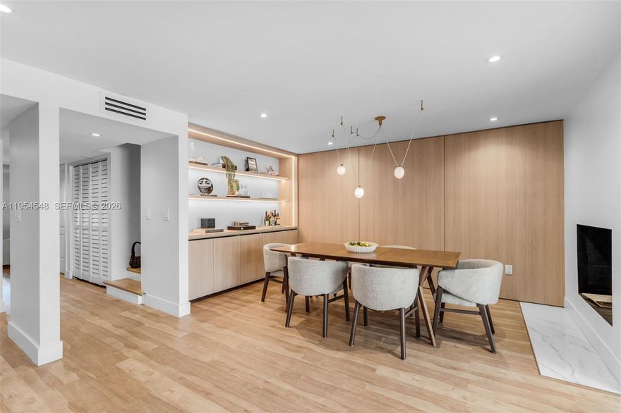 Rarely available 2,200 sq ft townhouse in The Banyans of South Miami, a well-established and conveniently located community. This two-story home offers three bedrooms, two and a half bathrooms, and an additional room that works well as a home office, den, or playroom. The bedrooms feature high ceilings and generous closet space, with the primary bedroom opening to a private balcony overlooking the backyard. Both front and rear outdoor areas provide comfortable space to unwind or gather with friends. The open kitchen connects naturally to the living areas. The home is move-in ready and thoughtfully laid out for everyday living. The Banyans is centrally located near South Miami Hospital, US-1, and the Palmetto Expressway. The unit includes a one-car garage plus an additional parking space. Residents have access to a community pool, gazebo, and tennis courts. The condo fee covers homeowners insurance, amenities, and common area maintenance.