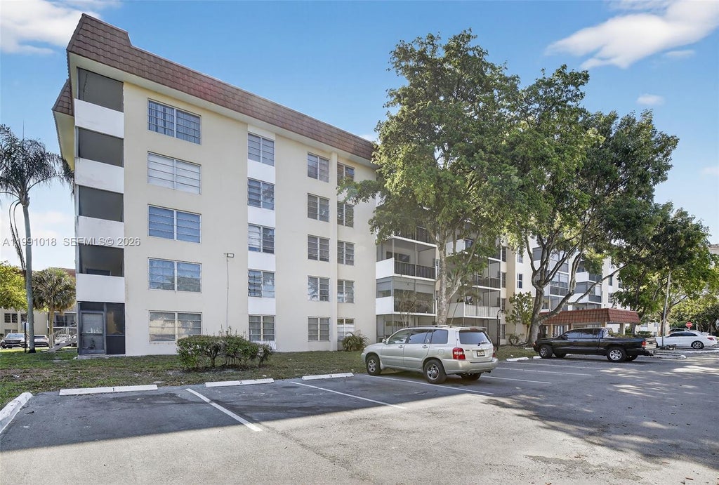 Photo of 4172 Inverrary Dr #503, Lauderhill, FL 33319 (MLS # A11991018)