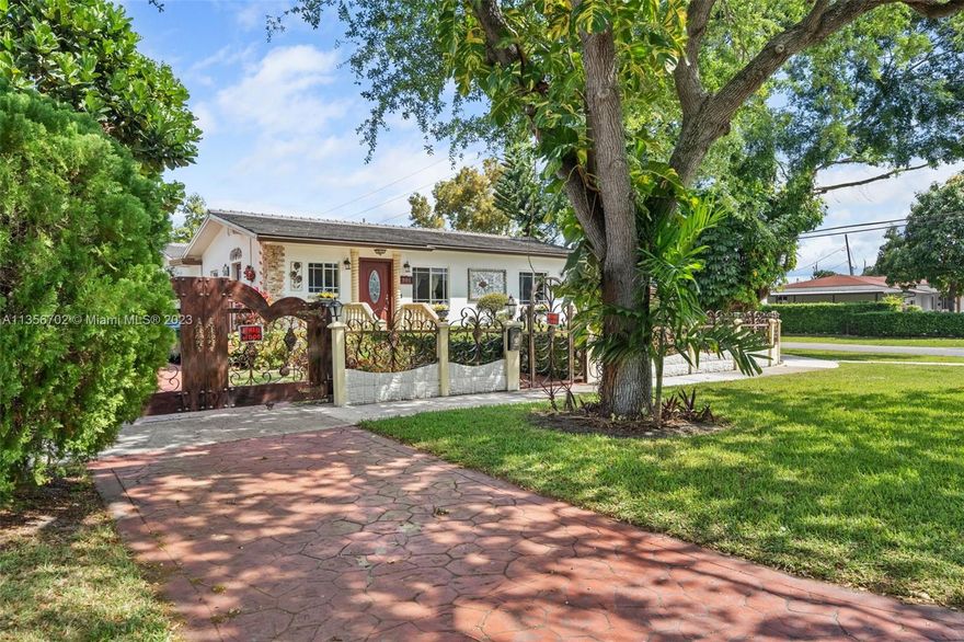 Stunning house! 3Bed/2Bath Corner unit, huge 10,125 SF total lot, fully gated. This house offers a lot of possibilities, plenty of space for a pool. 
It has a formal living room, a very spacious family room and formal dining room. Italian porcelain floors throughout. A large renovated kitchen that includes a gas burning range, stainless steel appliances, and granite counter tops. Very spacious master room with porcelain bathroom, glass shower door, his & hers walk-in closets. Beautiful patio, ideal to relax and entertain features outdoor terrace, BBQ area, Summer kitchen, and outdoor dining table. Laundry room with big washer and dryer. Impact windows and doors, and an utility room/house. Plenty of parking space. 5 mins away from the MIA Airport, close to Palmetto and Dolphin Expressways.