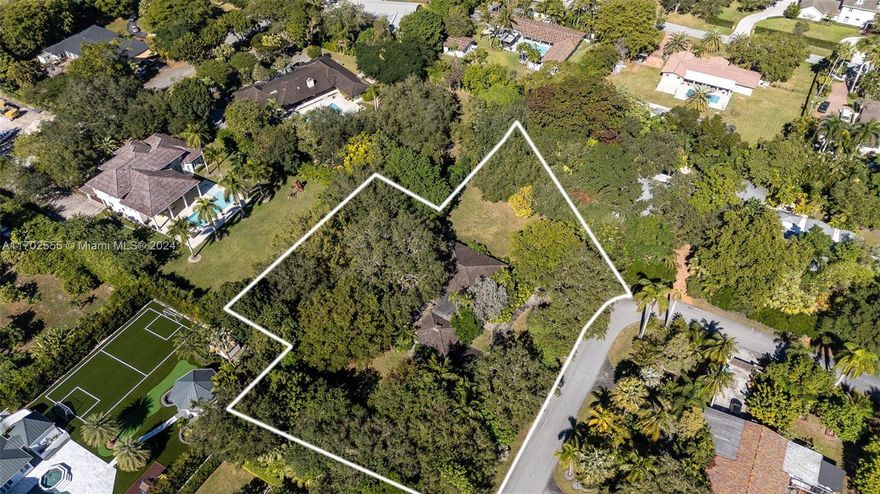 Own one of the largest lots in Pinecrest!  Set on over 1.3 acres in a quiet neighborhood in south Pinecrest, this lot offers ample possibilities for the construction of a dream house or compound.  Easy access to Old Cutler Road and Ludlam Road.  If privacy is what you desire, then look no further.  The property provides a nice balance of open grassy area and tree canopy.