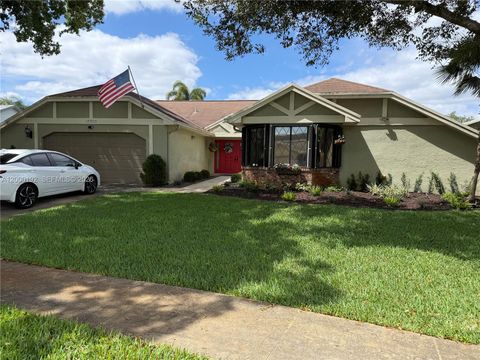 Photo of 15705 SW 7th Pl, Sunrise, FL 33326 (MLS # A12000192)