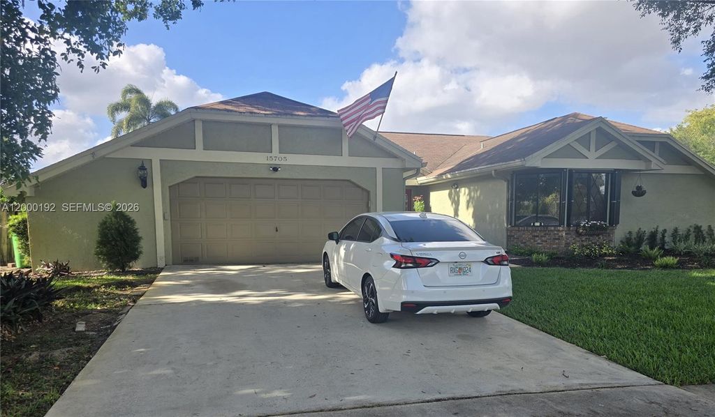 Photo of 15705 SW 7th Pl, Sunrise, FL 33326 (MLS # A12000192)