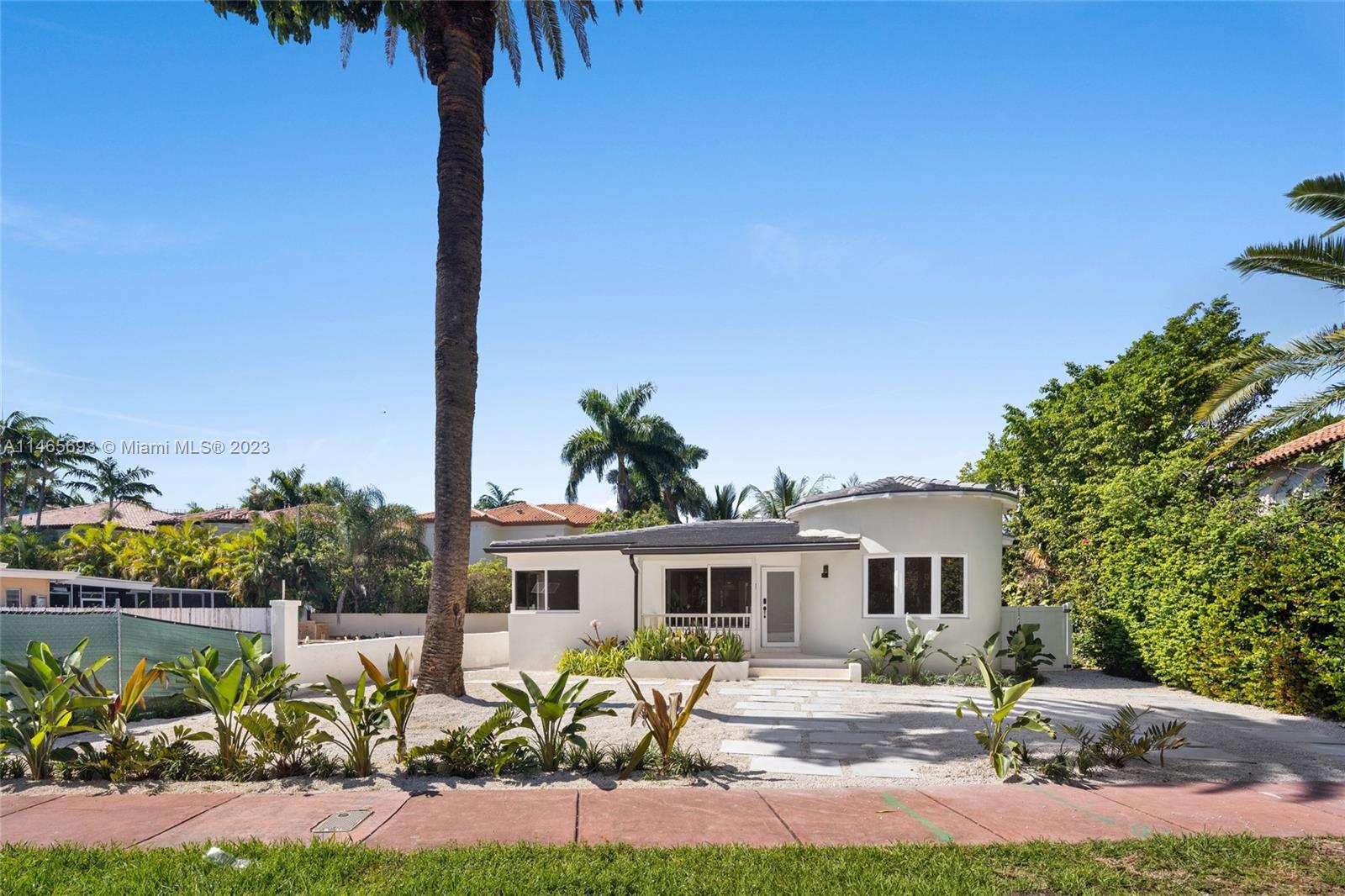 Discover luxury living in the heart of Miami Beach's coveted and secluded Alton Rd enclave, just steps away from vibrant 41st Street. This turnkey 2,172 sqft William Lane art-deco masterpiece has undergone a full renovation, embracing contemporary elegance. The main house boasts three bedrooms and two baths, while a two-story casita at the rear features two fully-equipped, detached studio suites – an idyllic sanctuary for a fitness studio, private home office, or staff & guest accommodations. A state-of-the-art gourmet kitchen showcases premium appliances and ample storage, and a sparkling new pool graces the backyard.