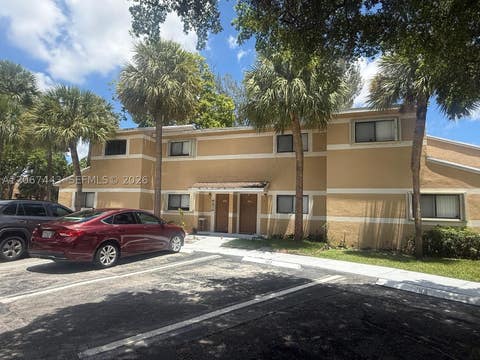 Photo of 203 E Palm Cir E, Pembroke Pines, FL 33025 (MLS # A12067443)