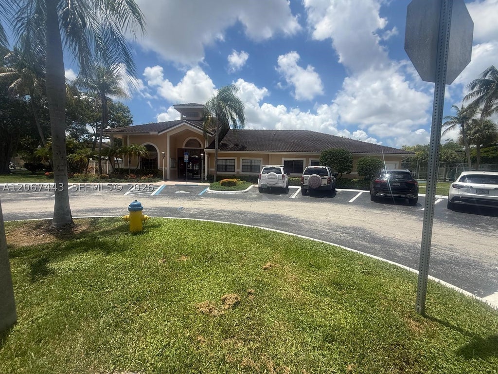 Photo of 203 E Palm Cir E, Pembroke Pines, FL 33025 (MLS # A12067443)