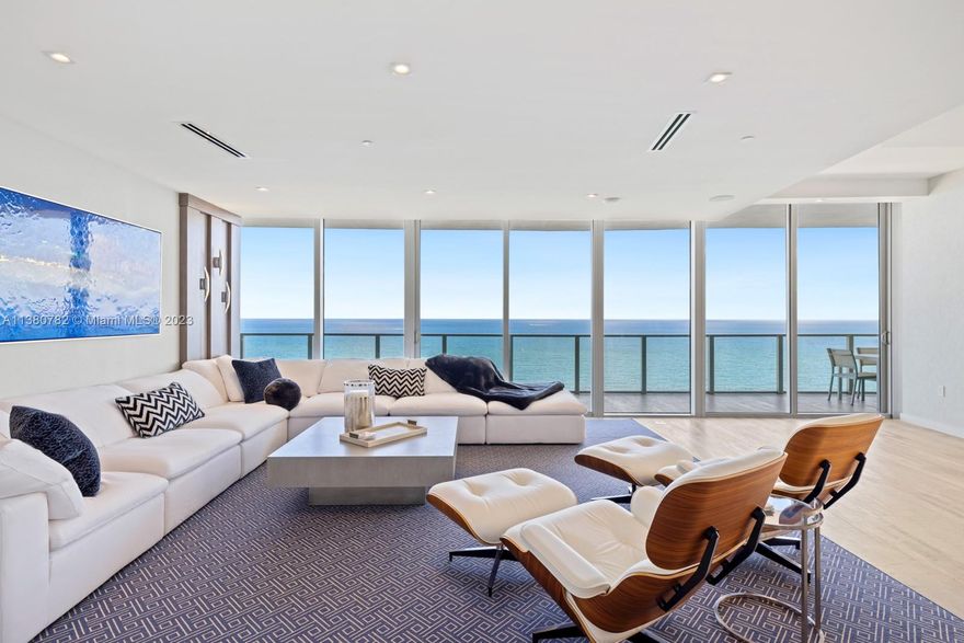 This effortless luxury Auberge Middle Penthouse is the only exquisite six-bedroom residence at Auberge Beach that boasts stunning ocean views. Situated directly on the sand, this magnificent penthouse offers a Turn-key design with beach sophistication in mind. This SE corner expansive floor plan was originally customized by the Developer to enhance the natural light coming through the floor-to-ceiling windows showcasing panoramic views of the ocean & intracoastal. The open-plan kitchen is equipped with high-end appliances, a large island with seating, and a separate dining area perfect for entertaining guests. The master suite is a true oasis with its private access to the oceanfront balcony. The other 5 bedrooms are also generously sized and feature en-suite bathrooms. Come to Experience