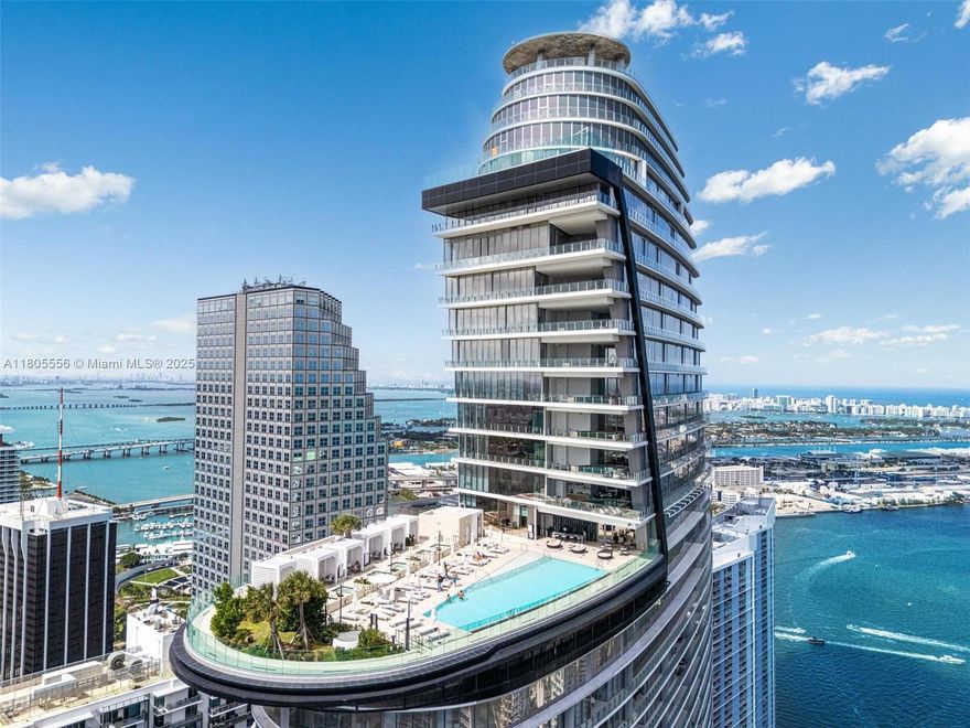 Sky-High Elegance on the 45th Floor Line 07.  Experience elevated living in this 2bd / 3bth residence of the iconic Aston Martin Residences. Spanning approximately 2,059 sq ft of interior space, the 232 sq ft terrace, provides sweeping views of the Biscayne Bay, Miami River, and the dynamic city skyline. Private elevator and private foyer. Residence features 10 ft floor-to-ceiling windows & panoramic views. Gourmet kitchen with Gaggenau appliances, Italian cabinetry, and sleek quartz countertops. Primary suite features a spa-inspired bathroom, a soaking tub, dual vanities, and a walk-in closet.  Aston Martin Residents world class amenities include a 55th floor infinity pool, fitness center, wellness spa, private movie theaters, & full service marina capable of accommodating super yachts.