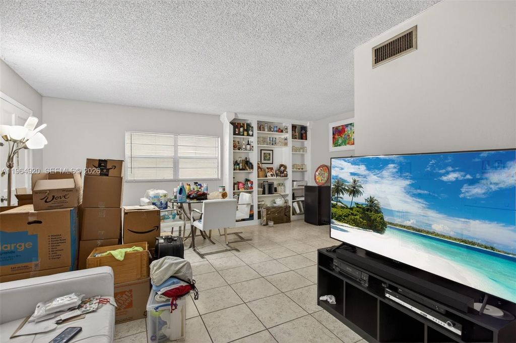 Photo of 4116 NW 88th Ave #101, Coral Springs, FL 33065 (MLS # A11964920)