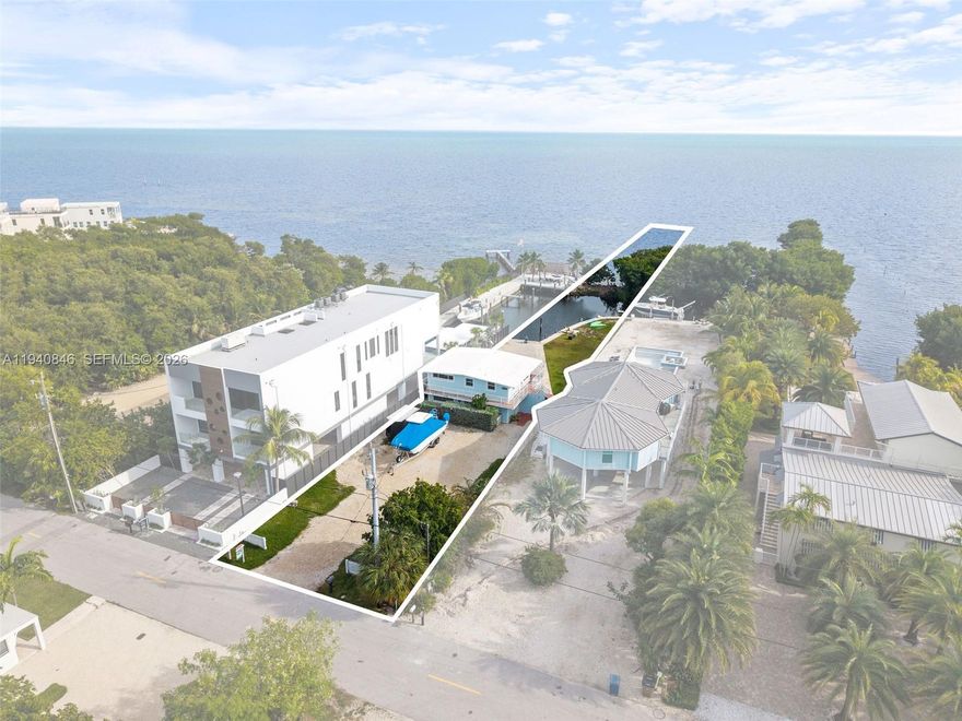 Ocean views, deepwater dockage, and the rare ability to legally operate nightly rentals. This exceptional oceanfront duplex offers a standout turnkey investment opportunity, combining the perfect trifecta for your portfolio: panoramic ocean views, deepwater dockage, and approved nightly rental capability. An ideal multi-family compound and a rare chance to own a fully versatile, income-producing Keys property. Enjoy oceanfront living with two beautifully updated units, each featuring 2 bedrooms and 1-bathroom, separate entrances, and its own oceanfront porch. Boating enthusiasts will appreciate the 100 feet of concrete dockage with immediate ocean access, along with the unique benefit of ownership of the ocean bottom, offering added value.  Zoning permits rentals with a minimum stay of just one night, giving you maximum income potential or the option to enjoy it as a private getaway. Whether you're looking to expand your investment portfolio or create your future oceanfront dream home, this duplex offers unmatched versatility and incredible potential in a beautiful setting. Plenty of parking and room for a pool, expansion or redevelopment!
