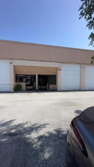 Excellent location for your business! Near Tamiami Airport in Kendall Business District. Small warehouse with 90sqft loft, central AC private bathroom, bay door 12 ft pluse small store front entrace for showcasing. Just off 120th St, near London Square. Thousands of cars drive by daily. The perfect spot for a start up or small business not requiring too many parking spaces. Zoned Light Industrial/commercial works for many businesses; sewing, carpentry, artists, amazon distribution, etc. NO Mechanincs or Music Studios.... First, last, security, must have liability insurance. Must present proof of funds, credit report. Association approval required takes 10 days. Can be seen and occupied immediately. Call for appointment.