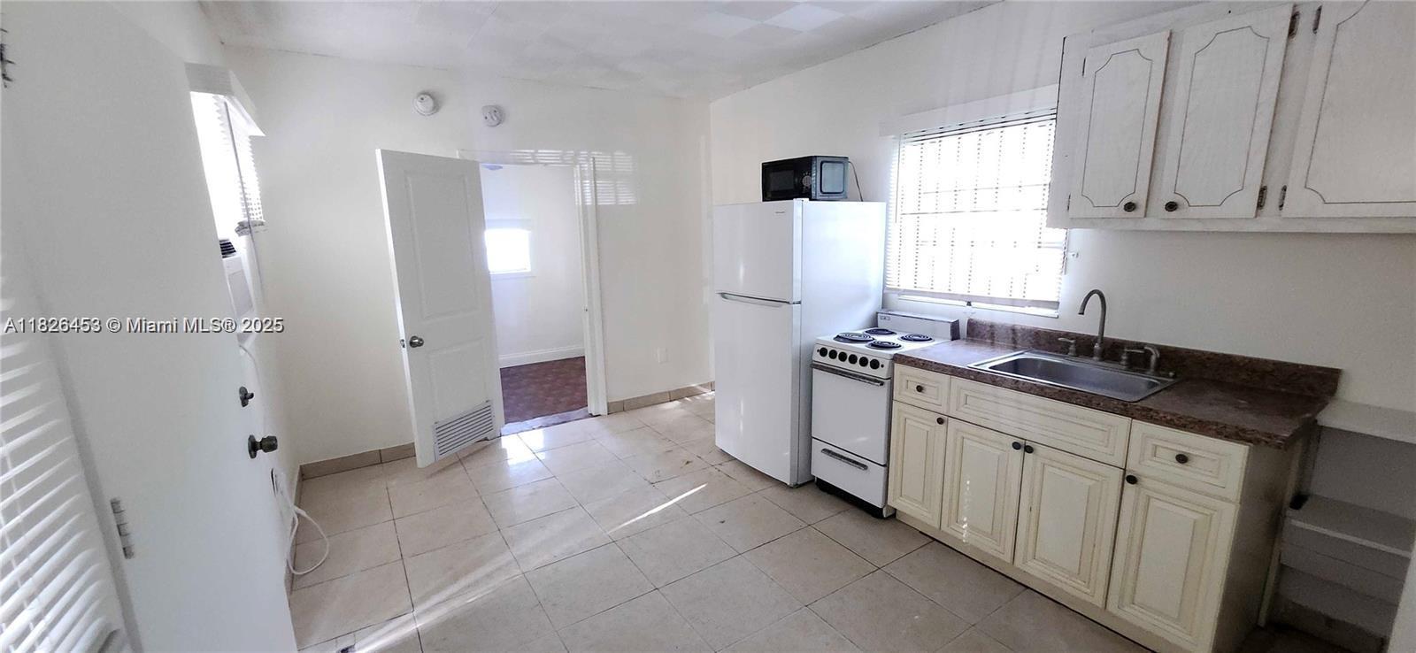 119 NE 56th 4