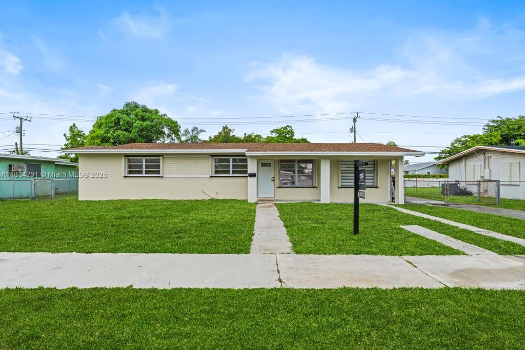 Charming 4-bed, 2-bath home with a spacious layout and lush backyard! Interior features include vinyl flooring throughout, a bright living area with a large family room perfect for entertaining. The kitchen offers wood cabinetry, stainless steel appliances. The backyard boasts mature fruit trees, open green space, and a storage shed. Driveway and side yard provide ample parking with room for a boat or RV. Additional highlights include a new roof. Conveniently located near schools, parks, shopping, and major roads. Easy to Show!
