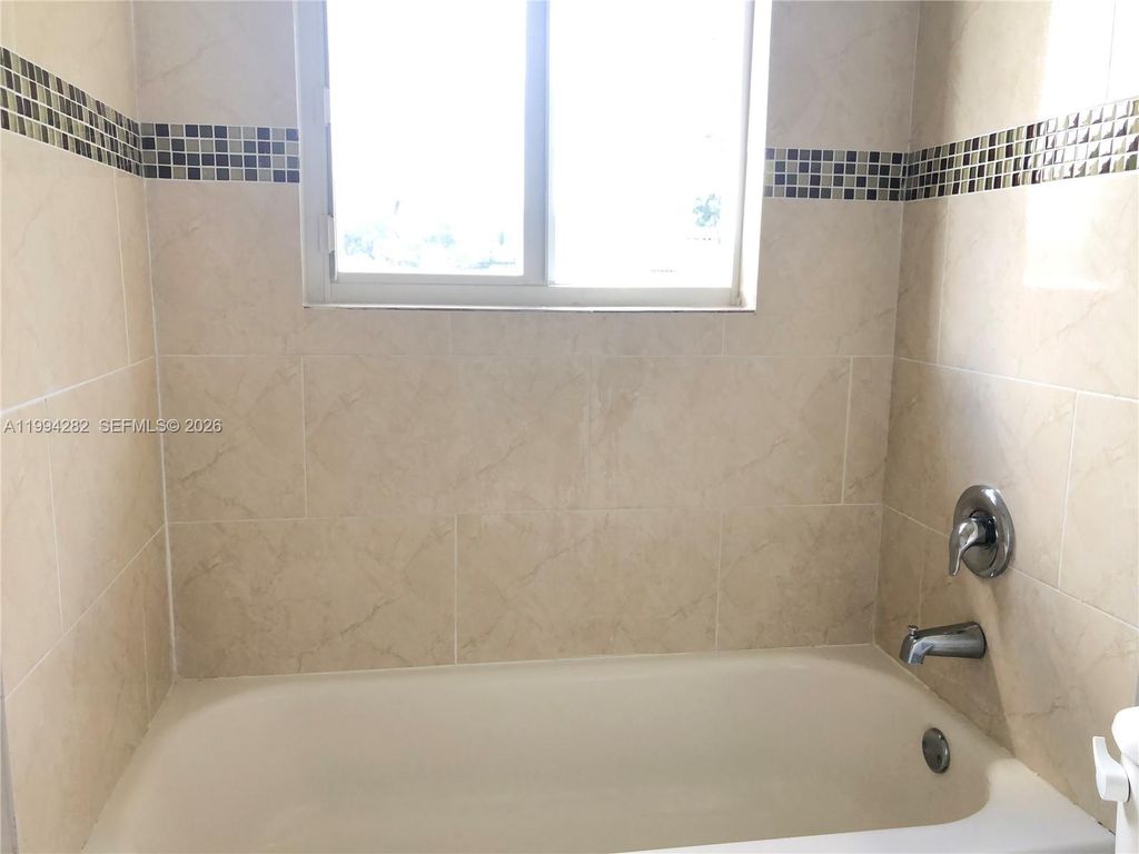 Photo of 1940 Washington Ave #11, Opa Locka, FL 33054 (MLS # A11994282)