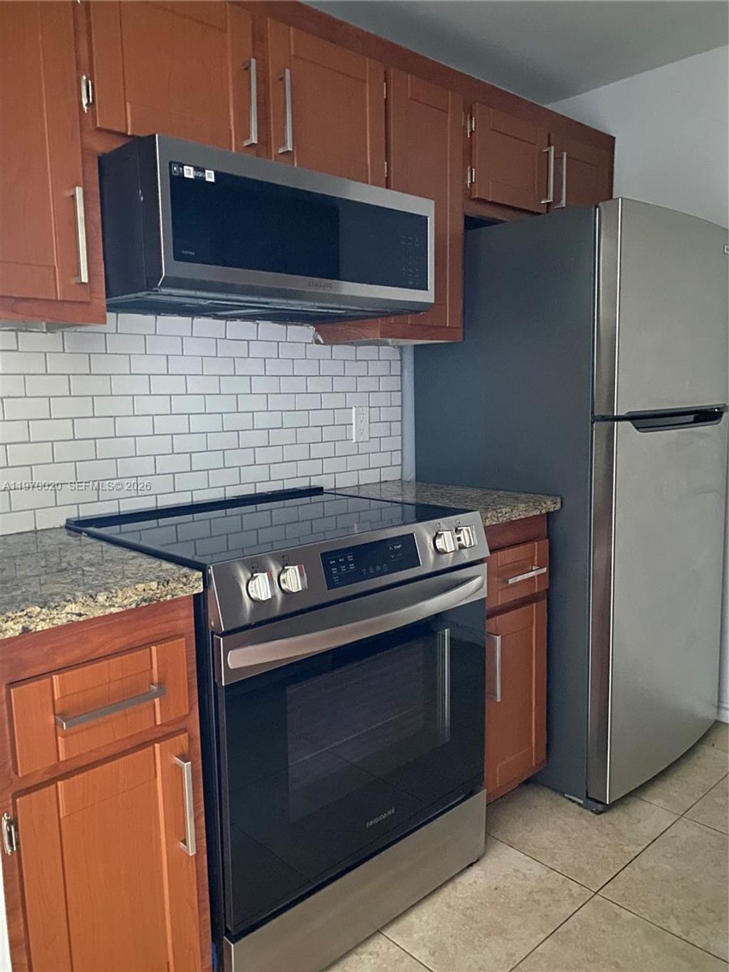 Photo of 301 SW 135th Ave #209C, Pembroke Pines, FL 33027 (MLS # A11970020)