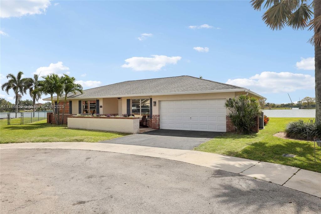 Photo of 1840 NW 40th Ct, Oakland Park, FL 33309 (MLS # A11786839)