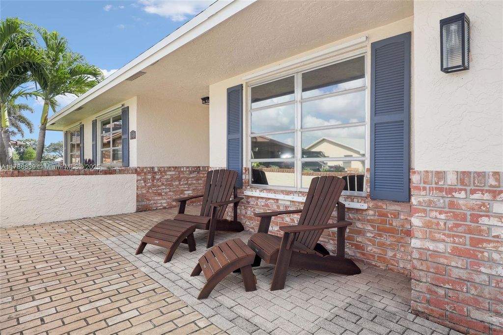 Photo of 1840 NW 40th Ct, Oakland Park, FL 33309 (MLS # A11786839)