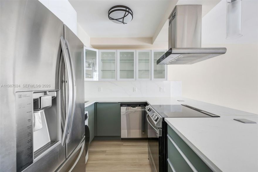 WATERFRONT LIVING+BOATDOCK Option! This waterfront gate guarded condo is located walking distance to restaurants and shopping and few minutes from Sunny Isles Beach. UNIT with IMPACT WINDOWS & HIGH END LAMINATE FLOORS.