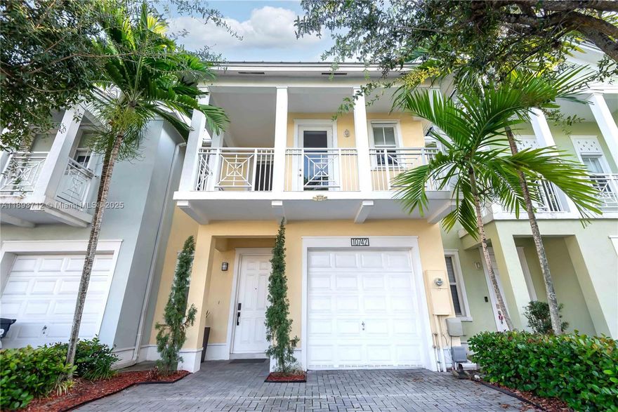 Completely renovated townhome in The Reserve at Doral East. Contemporary design with modern finishes and 10-ft ceilings; tile flooring on the first floor and original hardwood upstairs. Italian-style kitchen with quartz countertop and wood island extension, high-end appliances including double ovens and wine cooler. Impact windows and doors throughout, Trane A/C, LED lighting, electric blinds, and private balconies. Community includes a clubhouse with pool, gym, Wi-Fi room, playground, and 24-hour gated surveillance. Three assigned parking spaces plus guest parking.