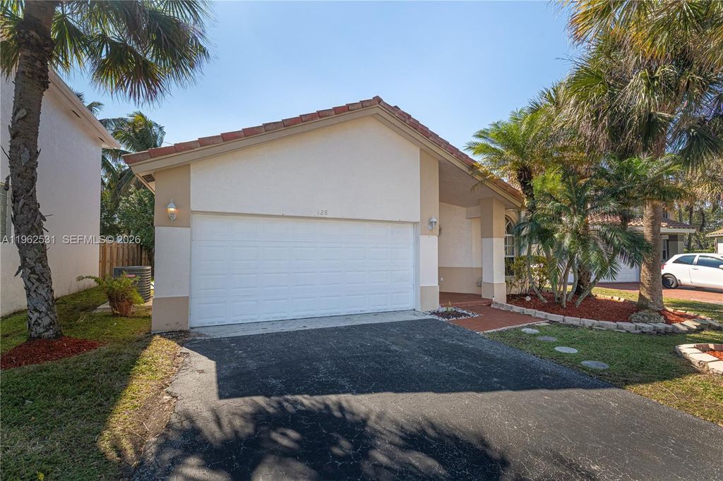 Photo of 128 Gables Blvd, Weston, FL 33326 (MLS # A11962531)