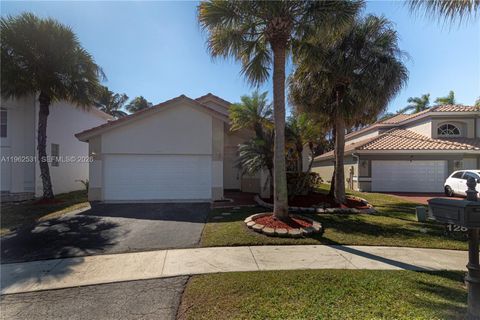 Photo of 128 Gables Blvd, Weston, FL 33326 (MLS # A11962531)