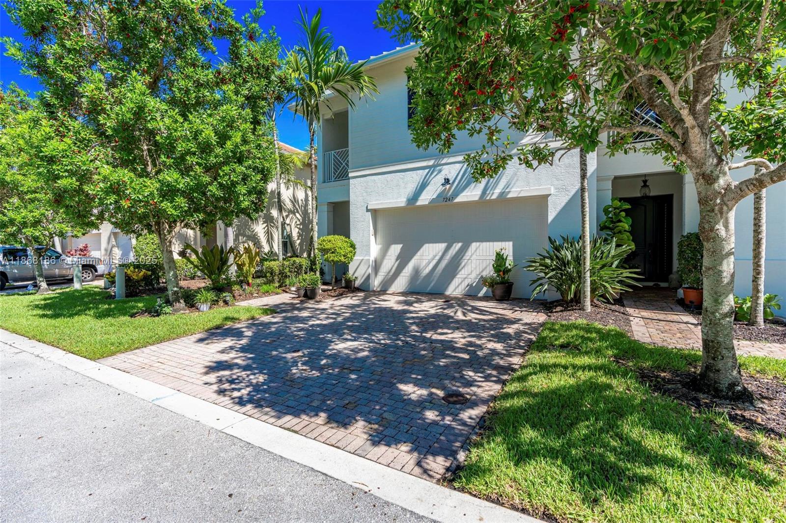This end unit townhome in a gated community backs to the preserve! Enjoy the beauty and privacy with a large patio in the rear. Open kitchen floor plan with custom cabinets, a kitchen island, and stainless steel appliances. New flooring upstairs with 3 bedrooms and a loft/multi-purpose area that makes a great office or extra tv room. Look no further, this home is in the best location in Palm Beach Gardens. Walk to restaurants! Minutes from 95 and the turnpike for a quick ride to the airport. Community has a gorgeous renovated pool, multi-purpose room, and gym, basic cable and wi-fi included with association dues! Act fast! This is the only unit now available in this sought-after community!