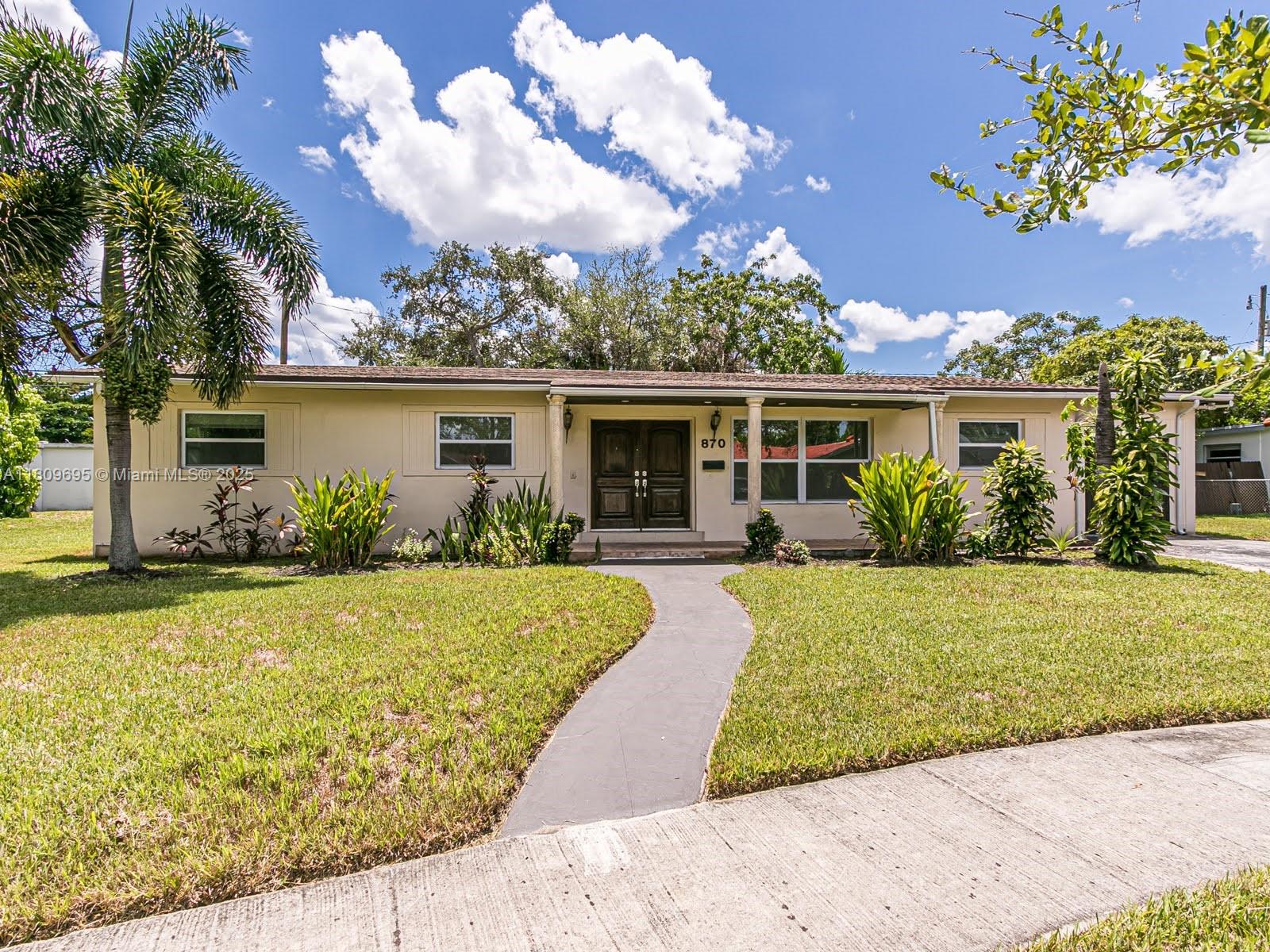 870 NE 182nd St .