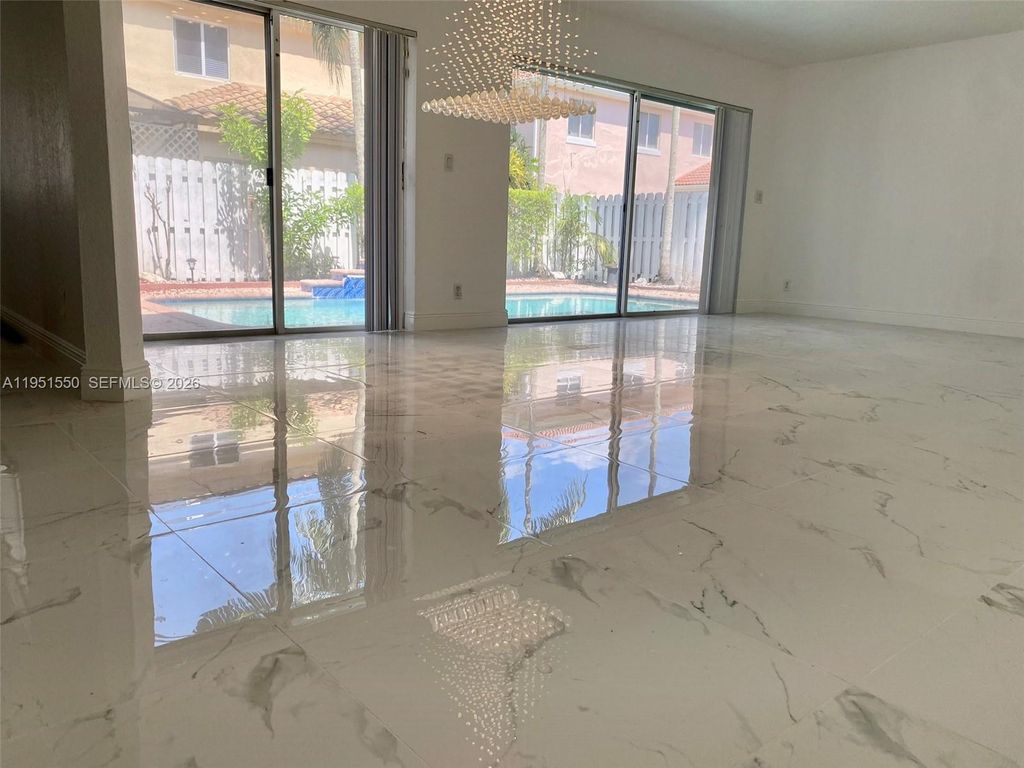 Photo of 11301 Rockinghorse Rd, Cooper City, FL 33027 (MLS # A11951550)