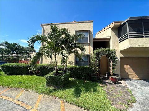 Photo of 3031 W Missionwood Ln #C-35, Miramar, FL 33025 (MLS # A11850958)