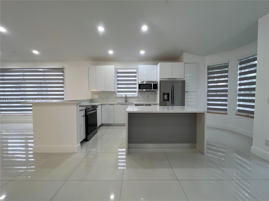 Photo of 853 NW 131st Ave, Pembroke Pines, FL 33028 (MLS # A11964665)