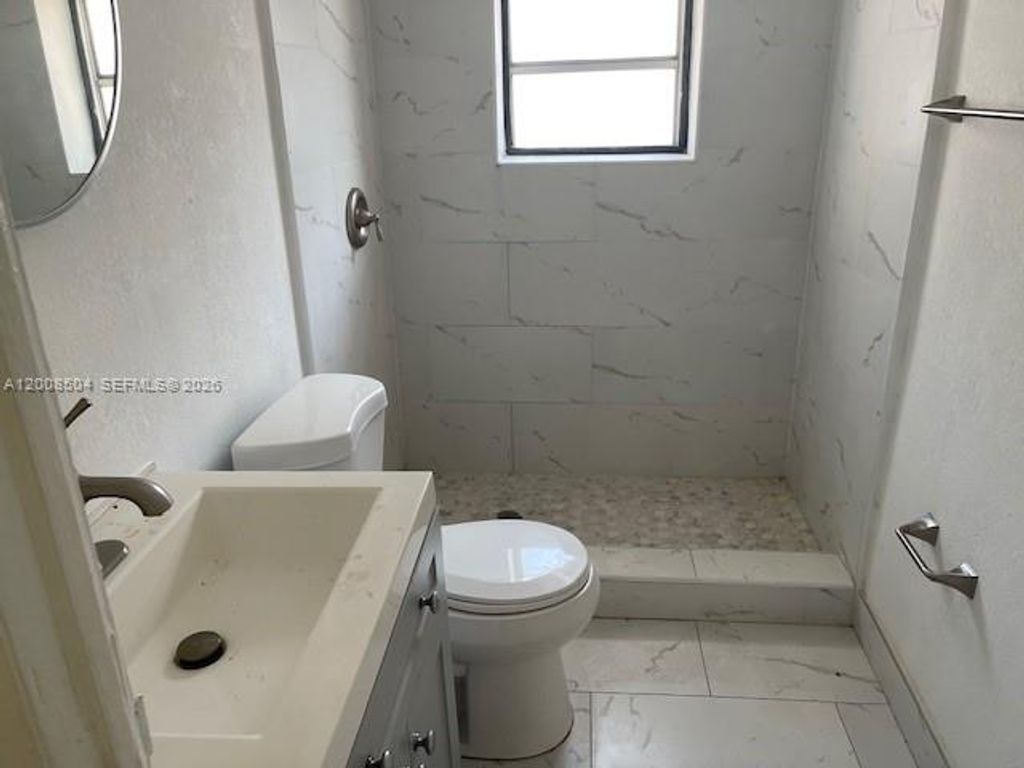 Photo of 410 NW 9th St, Hallandale Beach, FL 33009 (MLS # A12008504)