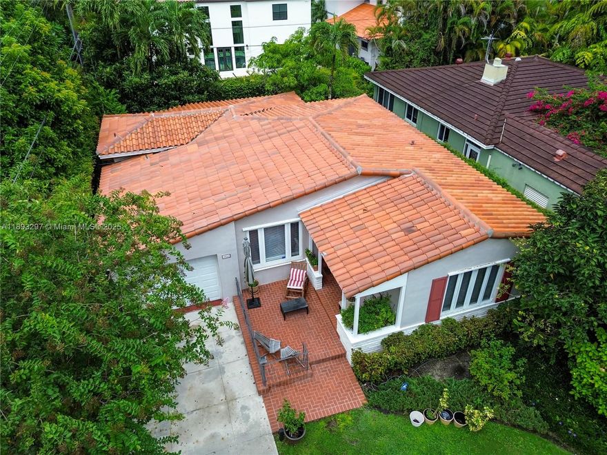 Welcome to an elegant sanctuary nestled beneath the majestic tree canopies of Coral Gables. This graceful 2-bedroom, 2-bath residence rests on a beautiful 5,000-square-foot lot, offering both privacy and tranquility in one of the city’s most desirable enclaves.
From the moment you arrive, the setting enchants — a peaceful street alive with birdsong and dappled sunlight. Inside, bright open spaces and refined finishes create a sense of quiet sophistication, perfect for both intimate living and stylish entertaining.
Moments from world-class dining, premier golf, and the cultural heart of Coral Gables, this home captures the essence of serene living — timeless and effortlessly elegant.
Exceptional location,discover where refined living meets natural grace—in the heart of Coral Gables.