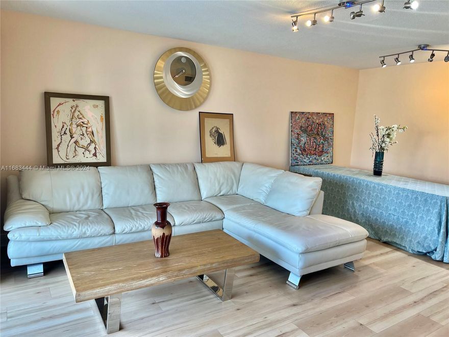 Beautiful CORNER 2BR 2BA in the heart of Hallandale Beach. Stunning eat-in kitchen features modern cabinetry, plenty of countertop space, new appliances & integrated storage system. Great natural sunlight throughout. Large primary: 3 built-in custom closets, 2 windows corner exposure & updated ensuite. Unit includes: updated guest BA, large foyer tile, new wide plank floors, freshly painted, screen balcony overlooking expansive courtyard, hurricane shutters, 1 assigned parking spot & 1 storage unit. Building has elevator, pool, clubhouse, green space & low maintenance fees! Great location: mins from the beach, Gulfstream shopping, transportation, restaurants & supermarkets. No Age restrictions. Easy to show. Priced to sell FAST! Cash Only price