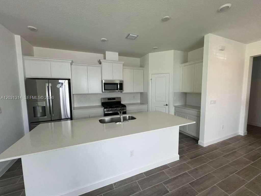 Photo of 1742 Hoot Owl Holw #1742, Loxahatchee, FL 33470 (MLS # A12021314)