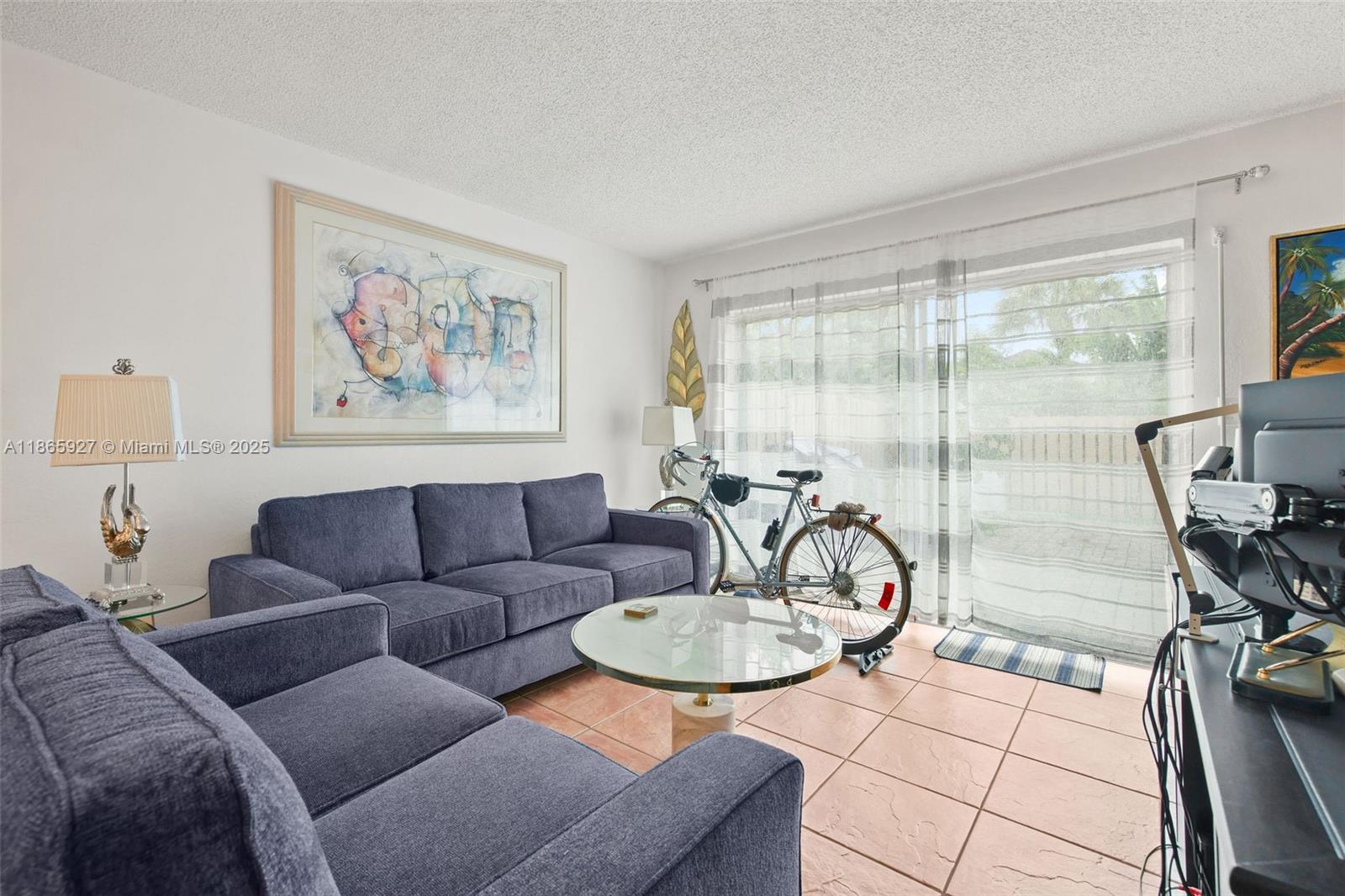 Updated 2 bedroom, 1.5 bathroom townhome in Dania Beach with a fully paved private patio, new 6-ft fence, sprinkler system for fruit trees, and whole-house generator. Seller recently invested $40,000 into the Property. Major upgrades include brand-new central A/C systems, water heater, and electrical panels. Interior features new ceramic flooring upstairs, fresh paint, breakfast bar with new Whirlpool dishwasher, mirrored accent wall, and contemporary dining chandelier. Community offers 2 parking spaces, guest parking, pool with lounge area and gazebo, plus exterior and landscape maintenance. Ideally located near beaches, dining, shopping, and the airport for easy South Florida living.