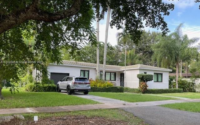PRIME SOUTH GABLES LOCATED NEXT TO COCONUT GROVE, AN UPDATED TRADITIONAL HOME WITH BRAND NEW HURRICANE WINDOWS AND DOORS. A PERFECT HOME FOR FAMILY OR HOME OFFICE IN A TROPICAL DOUBLE-LOT SETTING WITH PALMS AND AVOCADO TREES. BACK FENCE LINED WITH ARECA PALMS. HOOK-UP FOR ELECTRIC CAR. GLASSED FLORIDA ROOM FACING NORTH OVERLOOKS GARDEN.