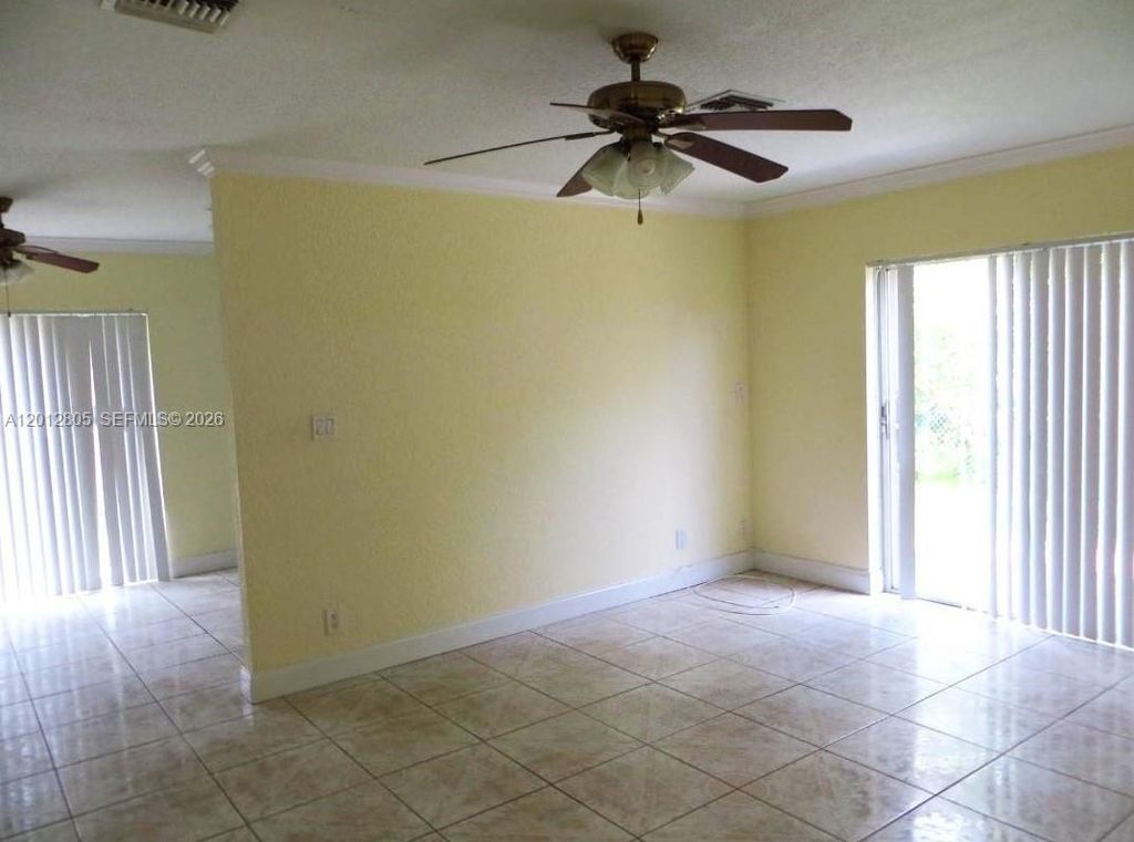 Photo of 3700 Riverside Dr #1, Coral Springs, FL 33065 (MLS # A12012805)