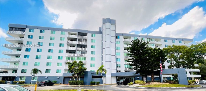 BEAUTIFUL Spacious & Bright 2 Bed/2 Bath with nice view balcony. New Impact Windows and sliding door, This apartment has been updated with an open concept design. Walk-in closet, Lots of closet space, additional storage. Great amenities, swimming pool, Gym, tennis courts,  laundry room with new washer and dryer in every floor. HOA fees include water, trash, pest control, security cameras, front guard. Located in a quiet neighborhood close to schools, hospital, shops, restaurants, beach, I-95 and Turnpike. Located in the desirable HILLCREST AREA.  Pleasant surroundings for walking or cycling. GREAT OPPORTUNITY FOR INVESTORS, UNIT CAN BE RENTED RIGHT AWAY. Building has reserve And the year certificación is done .