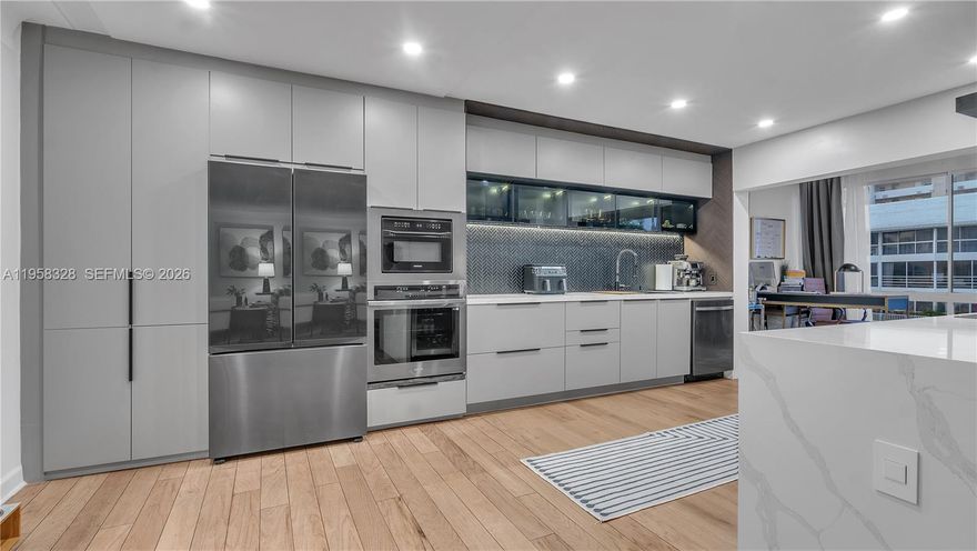 Experience luxury living in this beautifully remodeled 2-bedroom, 2-bathroom condo with breathtaking water views! Every detail has been thoughtfully designed, featuring a chef’s kitchen with an expansive island, quartz countertops, and top-of-the-line appliances—perfect for entertaining. The open-concept layout is flooded with natural light through large windows, creating a bright and airy ambiance. Both bathrooms have been exquisitely remodeled with high-end finishes. Enjoy peace of mind with a new roof assessment already paid by the seller. Boat lovers rejoice! A dock is available for rent, accommodating boats up to 45 feet. Located just minutes from restaurants, bars, shopping, and within walking distance to the beach.