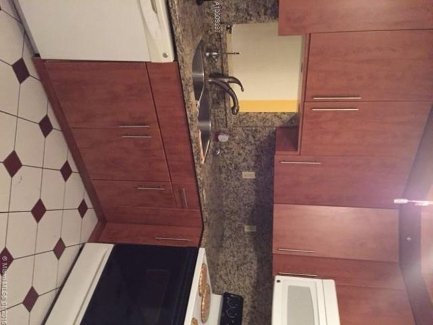 BEAUTIFUL REMODELED 2/2 IN A QUIET 55+ COMMUNITY, UNFURNISHED, CLOSE TO SHOPPING AND 1 MILE TO BEACH OFF SHERIDAN ST. , YOU WILL LOVE THIS UNIT. SIT ON BACK PATIO OVERLOOKING A SERINE POND