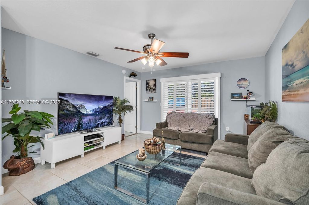 Photo of 4332 NW 120th Ln, Sunrise, FL 33323 (MLS # A11990319)