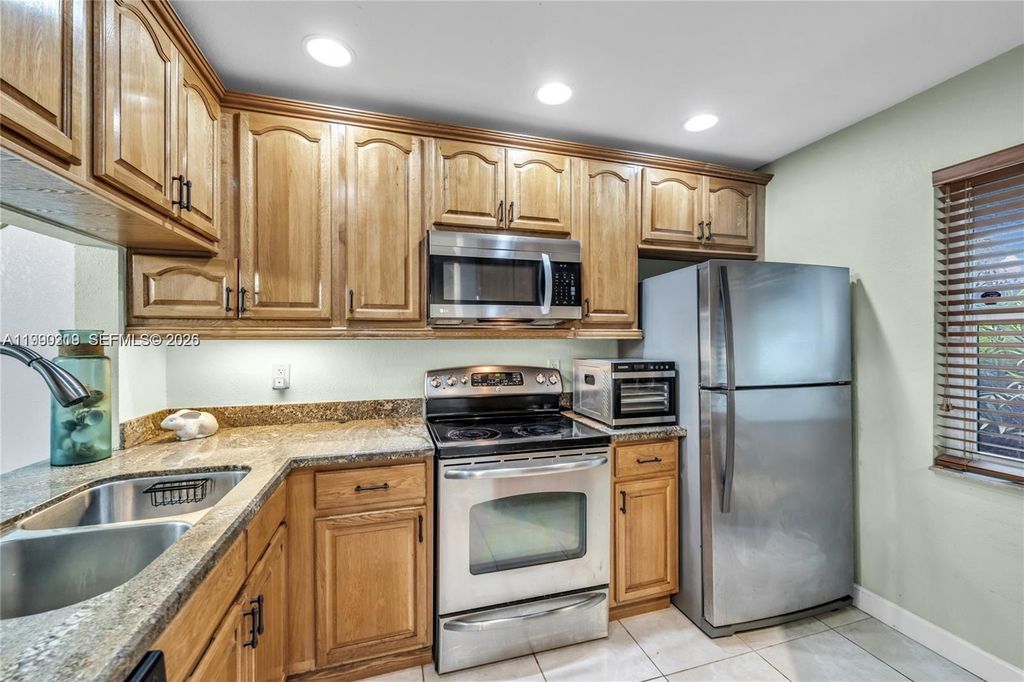 Photo of 4332 NW 120th Ln, Sunrise, FL 33323 (MLS # A11990319)