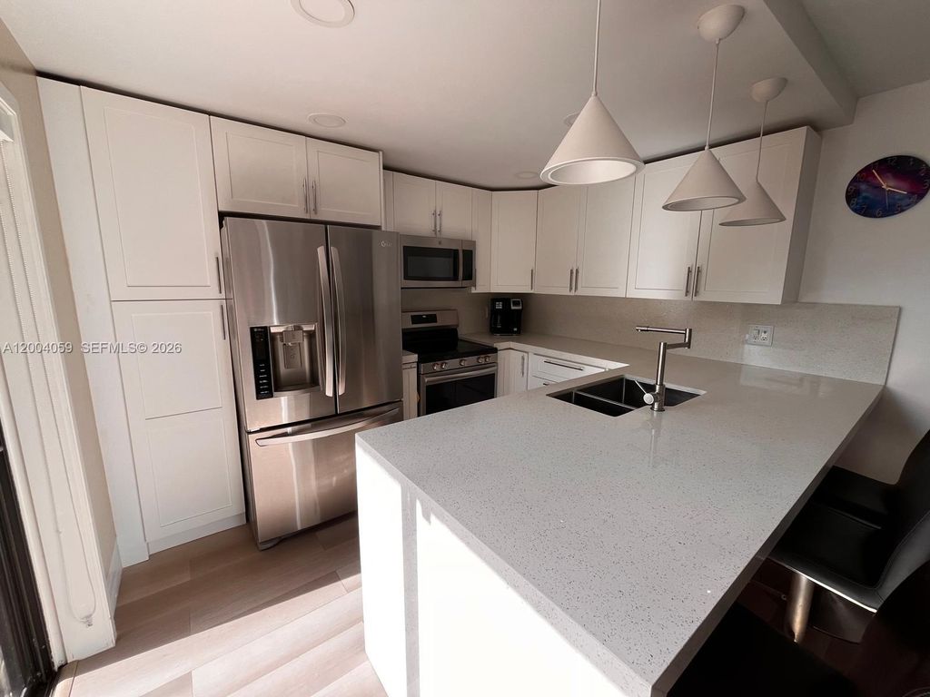 Photo of 11912 SW 11th Ct, Davie, FL 33325 (MLS # A12004059)