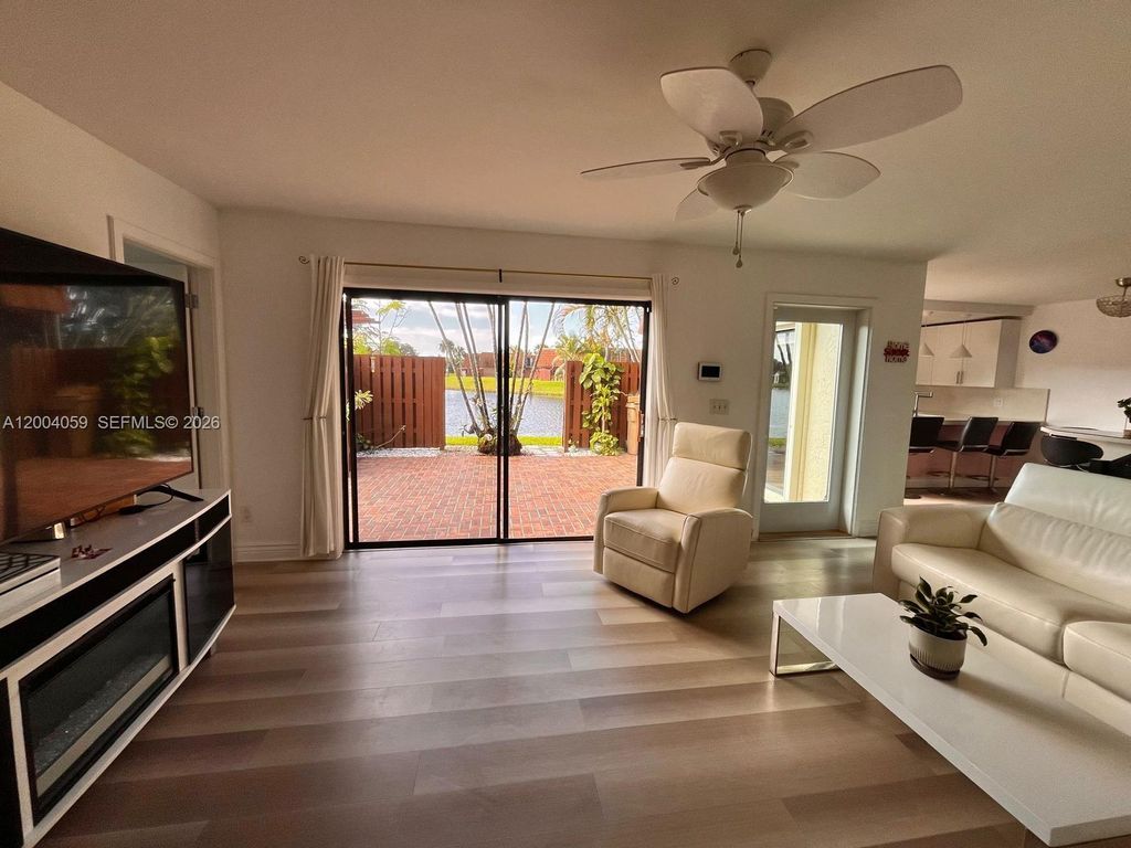 Photo of 11912 SW 11th Ct, Davie, FL 33325 (MLS # A12004059)