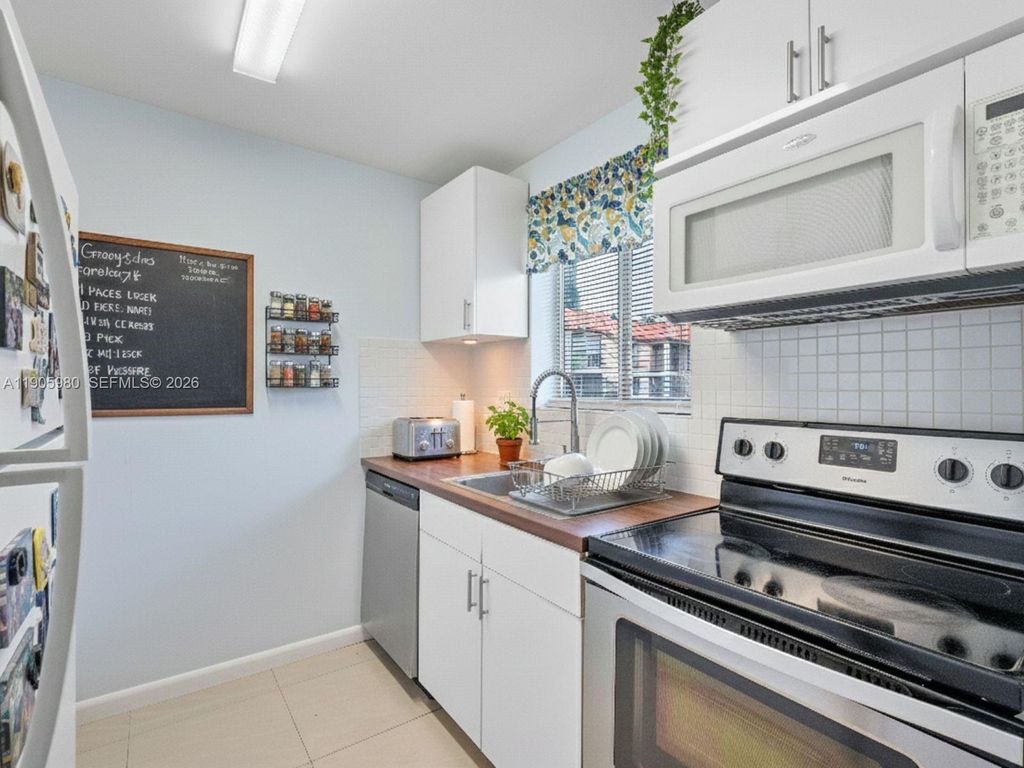 Photo of 6060 Forest Hill Blvd #103, West Palm Beach, FL 33415 (MLS # A11905980)