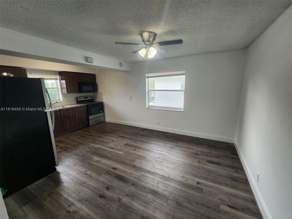 Photo of 4117 Woodside Dr #2, Coral Springs, FL 33065 (MLS # A11816459)