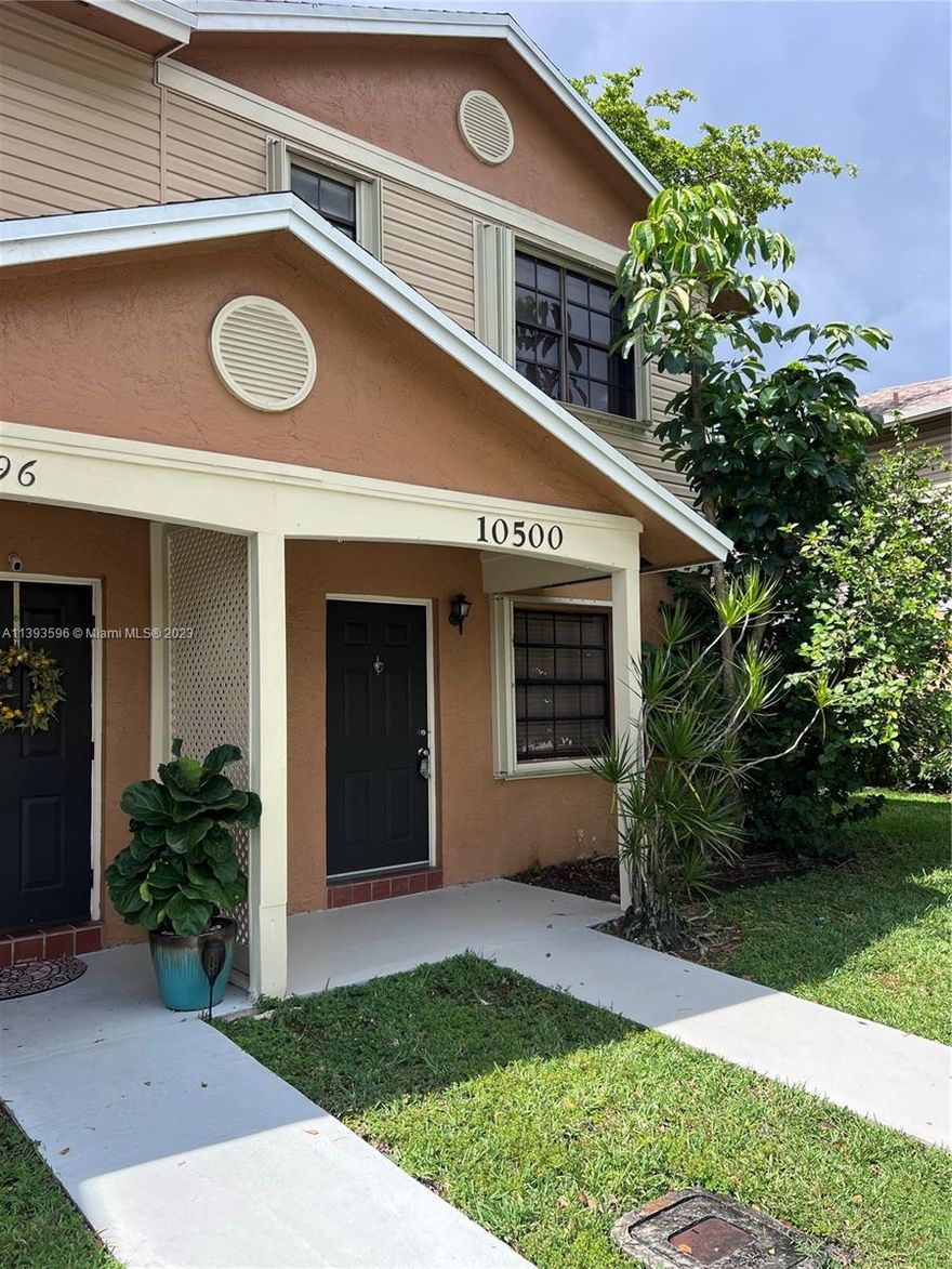 Beautiful townhome in Pembroke Pines! This corner unit is perfect for first-time buyers and boasts an amazing view of the lake from the terrace. The back patio is fenced and provides a great space for outdoor activities. The first floor features original Mexican tile while the second floor and stairs have laminated wood floors. Newer full-size washer/dryer. The community ammenities includes a pool, tennis, a gated playground and more. Close to Pembroke Lake Mall, Walgreens, Home Depot, Memorial West Hospital, great A+ schools, CB Smith Park & restaurants. Dogs under 50lb and cats are allowed. HOA fees include cable, trash, basic internet, and roof, which was replaced about a year ago.