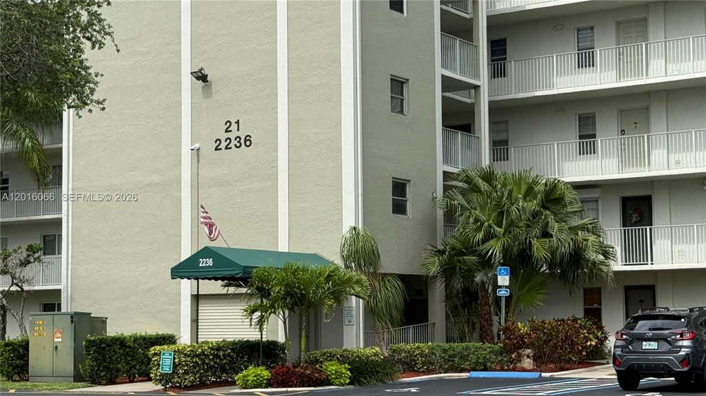 Photo of 2236 N Cypress Bend Dr #207, Pompano Beach, FL 33069 (MLS # A12016066)