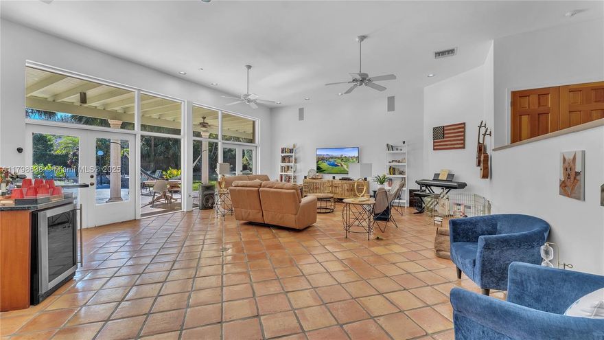 Home on cul-de-sac with almost an Acre!  No traffic street. Also features high ceilings!  Discover luxury living in this stunning 4BR/3.5BA estate featuring a gourmet kitchen, open living spaces, and a private master suite with spa-like bath, plus a resort-style pool surrounded by lush landscaping and mature mango trees on an oversized lot with circular driveway parking for 6+ cars - enjoy premier access to top-rated schools, upscale shopping, acclaimed dining, Dadeland Mall, Evelyn Greer Park, and just minutes to Coral Gables, Coconut Grove and Key Biscayne beaches.