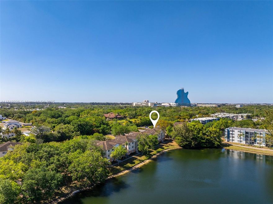 Spacious and bright 2-bedroom, 1-bath top-floor unit in the sought-after Lakewood at Emerald Hills. This well-maintained and renovated condo features water views, high ceilings, ample closet space and in-unit washer/dryer. Enjoy amenities including a pool, gym, clubhouse, and tennis courts. Gated community located just minutes from Hard Rock Hotel, TY Park, Dania Pointe, I-95, and the Turnpike. Currently vacant, and also available for rent at $2,050/month. This unit can be sold with 3 other units within the community as a packaged deal. Contact listing agent for additional information and private showings.